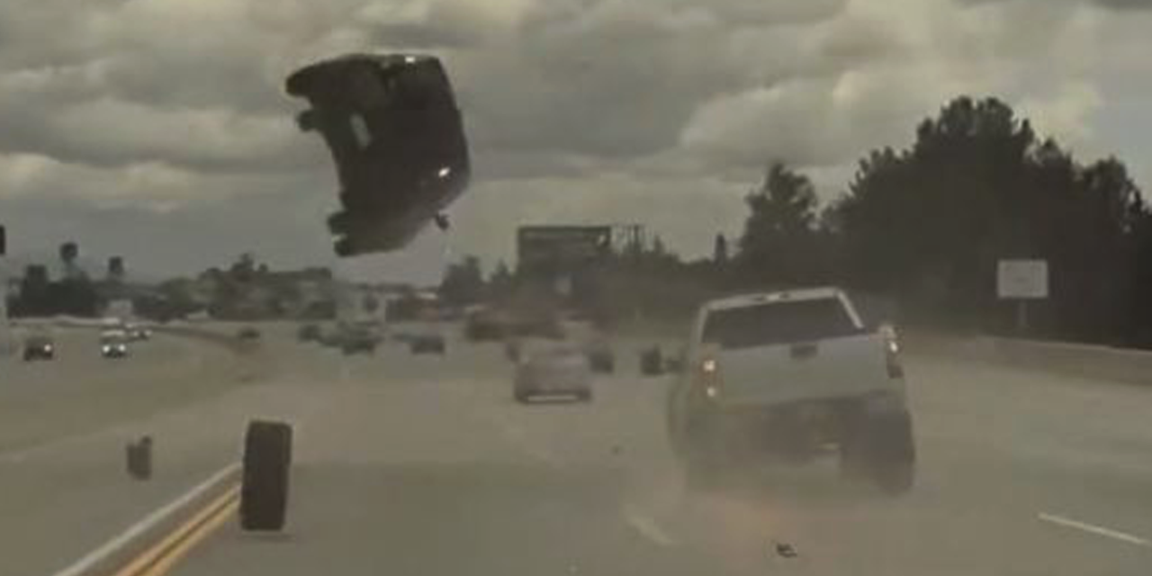 VIDEO: Car Launched 10ft in the Air After Being Hit by Stray Tyre